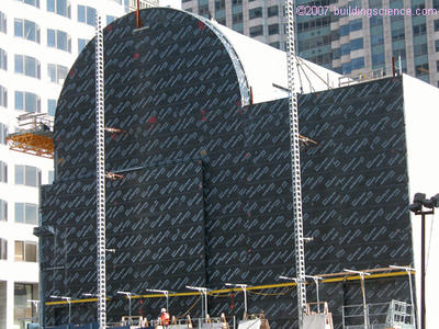 Photo_01: Exterior air barrier using adhered membrane (note the air barrier continuity where the wall meets the roof)