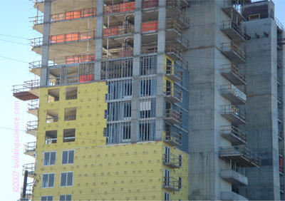 Photo_06: Non-paper faced exterior gypsum sheathing over uninsulated steel cavity